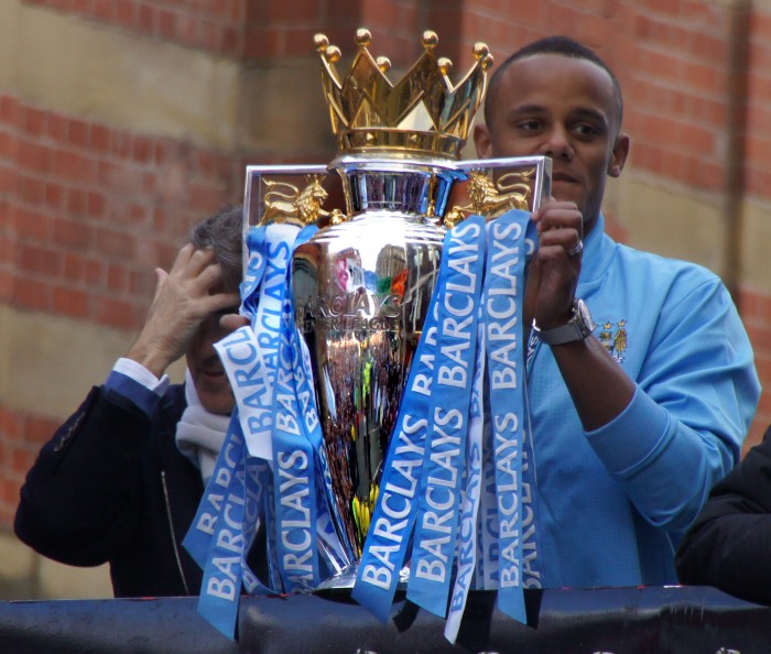 Vincent_Kompany_holds_up_the_Premier_League_trophy_2012