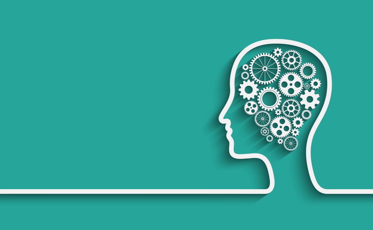 Illustration of a head with lots of cogs in it