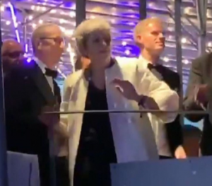 Theresa May poker face