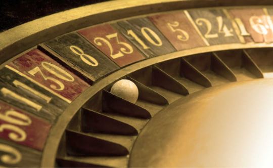 Ball on and old roulette with numbers