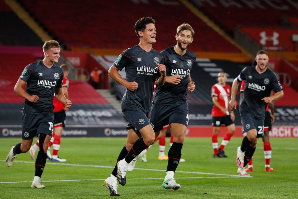 Christian Norgaard celebrates with Brentford teammates after scoring against Southampton